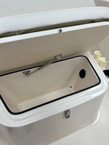 Slide: The Image of Open storage compartment on 2025 Grady-White Fisherman 180 boat. - 7