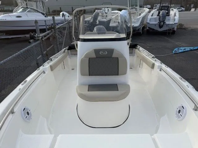 Slide: The Image of 2025 Key West 189 FS boat interior with seating and steering console. - 7