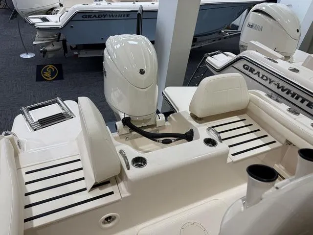Slide: The Image of 2025 Grady-White Fisherman 216 boat interior with Yamaha outboard motor. - 6