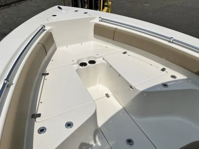 Slide: The Image of 2019 Key West 239FS boat interior with seating and cup holders. - 8