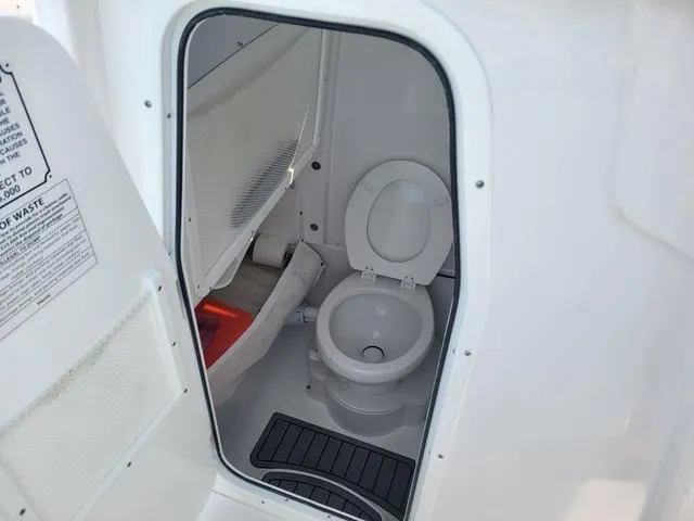 Slide: The Image of 2024 Sea Hunt Gamefish 27 boat interior toilet compartment. - 17