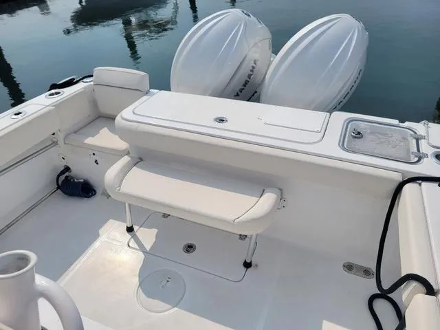 Slide: The Image of 2024 Sea Hunt Gamefish 27 boat with forward seating and dual engines. - 9