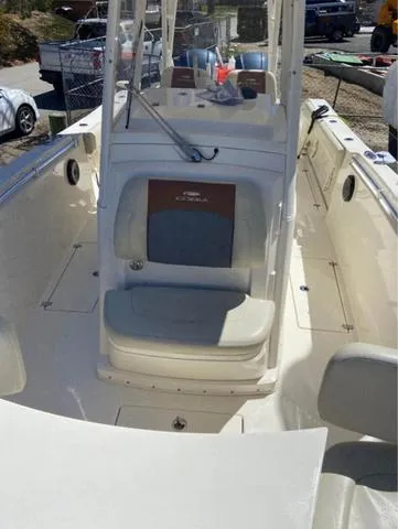 Slide: The Image of 2019 Cobia 301CC boat interior with seating and console. - 9