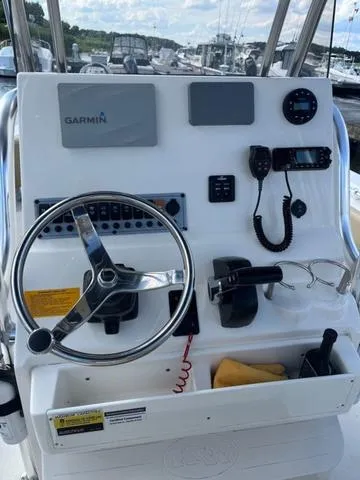 Slide: The Image of 2020 Key West 219fs boat dashboard with Garmin navigation and controls. - 10