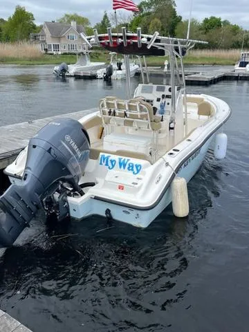Slide: The Image of 2020 Key West 219fs boat docked, featuring Yamaha outboard motor and "My Way" name on the stern. - 7