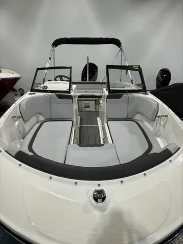 Slide: The Image of 2024 Bayliner M17 boat interior with open seating and modern design. - 10