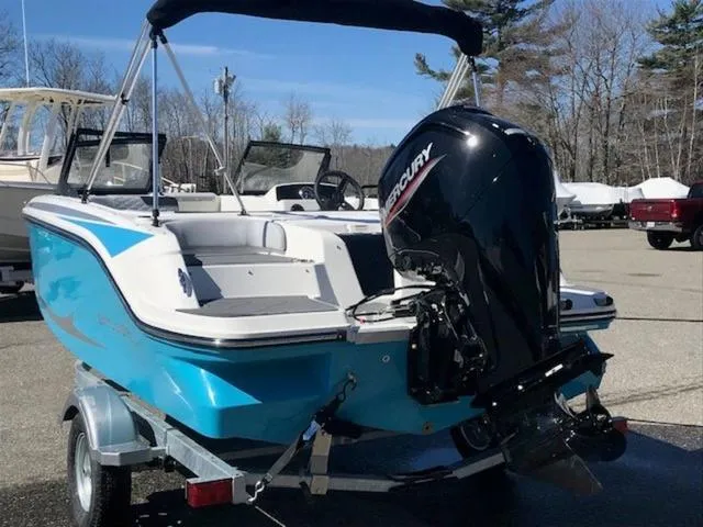 Slide: The Image of 2024 Bayliner M17 boat with Mercury outboard motor on a trailer. - 3