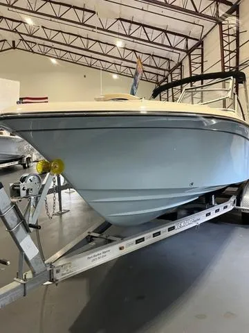 Slide: The Image of 2024 Grady-White Freedom 215 boat on trailer in indoor storage facility. - 3