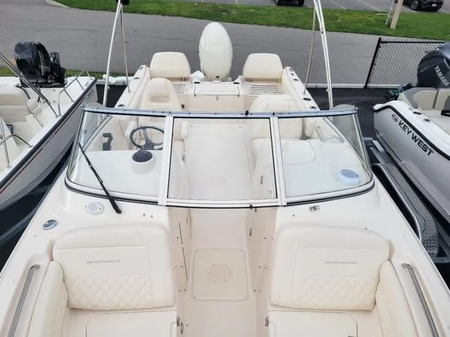 Slide: The Image of 2025 Grady-White Freedom 215 boat with spacious seating and sleek design. - 18