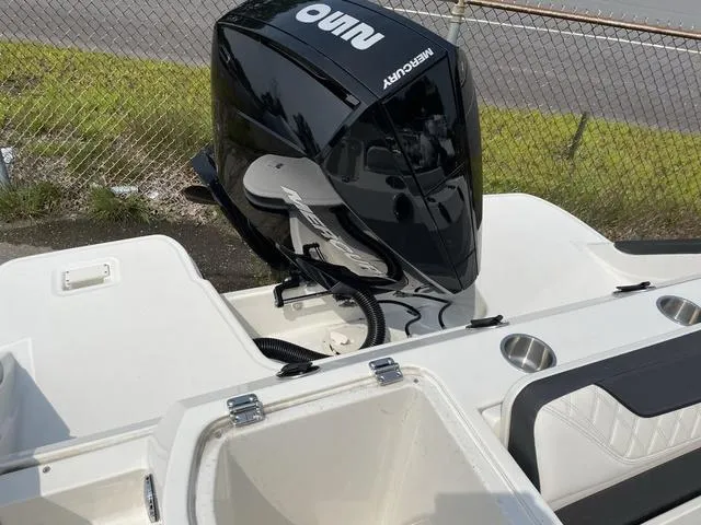 Slide: The Image of 2023 Trophy T 24 CC boat with Mercury outboard motor, rear view. - 10