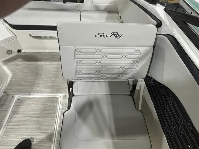Slide: The Image of 2024 Sea Ray 210 SPX boat seat with embroidered logo and modern design. - 11