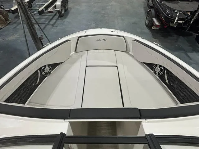 Slide: The Image of 2024 Sea Ray 210 SPX boat interior with spacious seating and sleek design. - 6