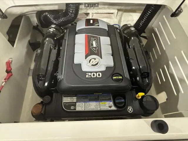 Slide: The Image of 2024 Sea Ray 210 SPX boat engine, featuring a 4.5L 200 horsepower motor. - 8