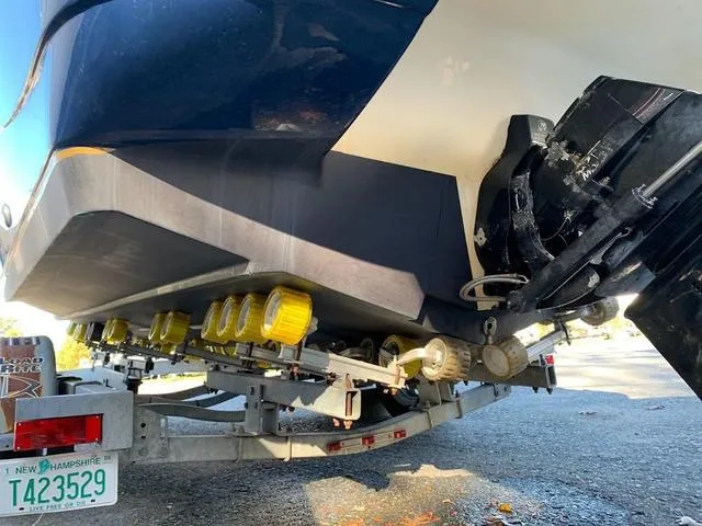 Slide: The Image of Rear view of a 2006 Hurricane 25' DC boat on a trailer. - 14