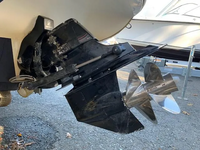 Slide: The Image of 2006 Hurricane 25' DC boat propeller and outdrive on display. - 17