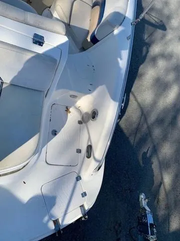 Slide: The Image of 2006 Hurricane 25' DC boat deck with seating and storage compartments. - 22