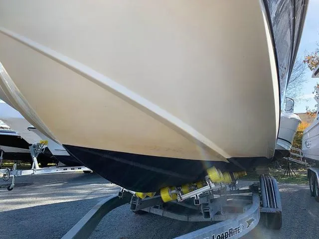 Slide: The Image of 2006 Hurricane 25' DC boat on trailer, viewed from below. - 3