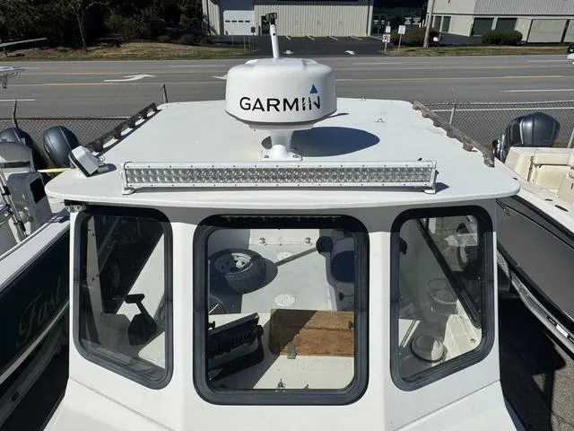 Slide: The Image of 1996 Eastern 27 Lobster Fisherman boat with Garmin radar on the roof. - 11