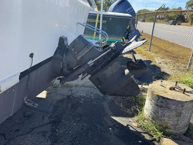 Slide: The Image of 1996 Eastern 27 Lobster Fisherman boat with visible outboard motor and propeller. - 13