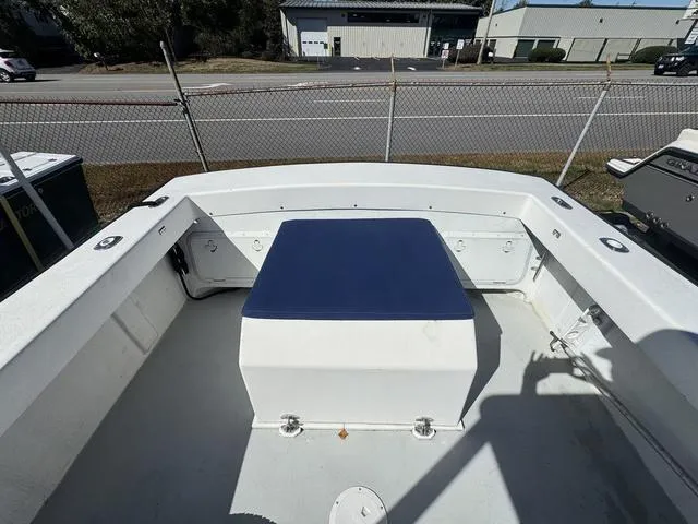Slide: The Image of 1996 Eastern 27 Lobster Fisherman boat deck with blue cushioned seat. - 8