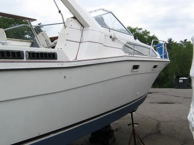 Slide: The Image of 1983 Bayliner 2850 Contessa boat on dry dock, side view. - 16