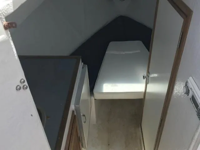 Slide: The Image of Interior cabin of 2003 Eastern 27' Lobster boat with bed and kitchenette. - 12