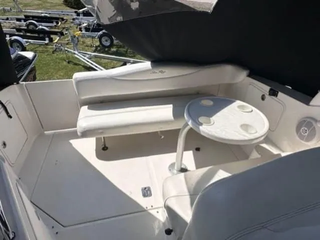 Slide: The Image of 2007 Sea Ray 280 Sundancer boat interior with seating and table. - 8