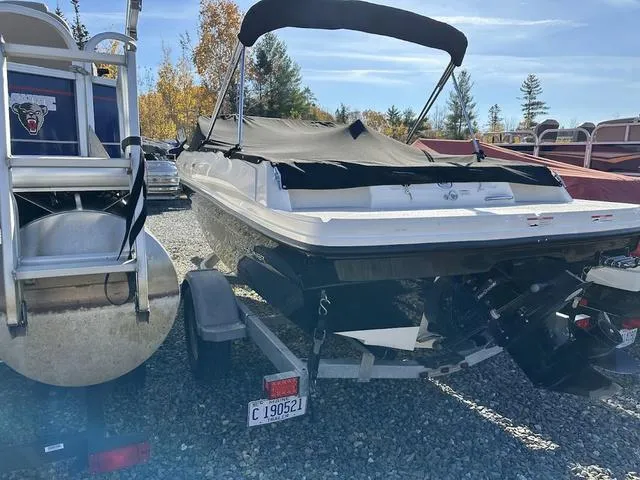Slide: The Image of 2018 Bayliner VR4 boat on trailer, covered, parked outdoors. - 4