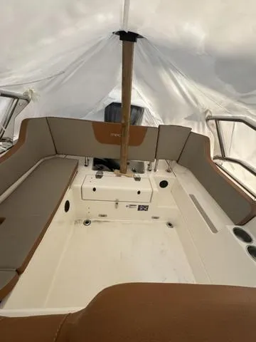 Slide: The Image of 2024 Zodiac Boats Medline 6.8 interior, featuring spacious seating and modern design. - 5