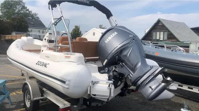 Slide: The Image of 2024 Zodiac Boats Medline 6.8 with Yamaha engine on trailer. - 9
