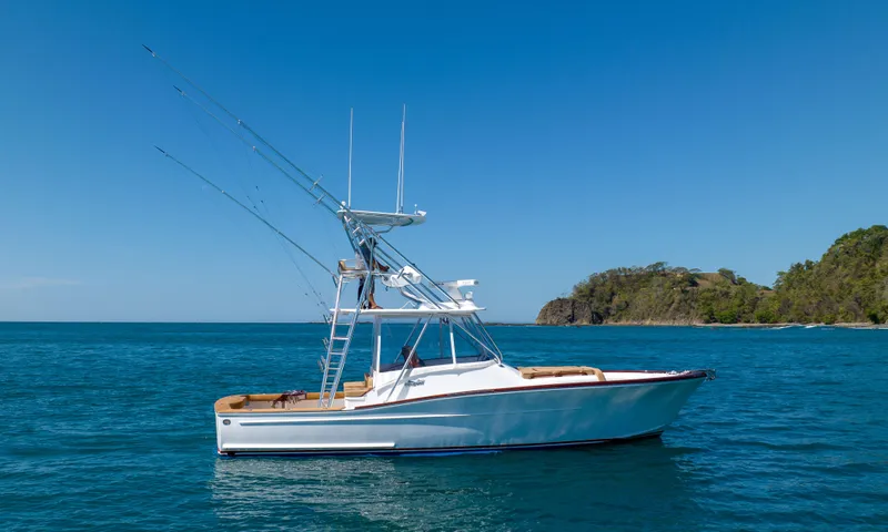 Slide: The Image of 2024 Maverick Yachts Costa Rica 36 Walkaround on blue ocean, clear sky background. - 11
