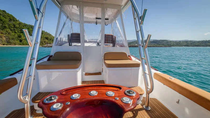 Slide: The Image of 2024 Maverick Yachts Costa Rica 36 Walkaround, luxurious deck view on serene waters. - 15