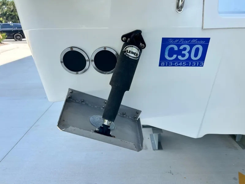 Slide: The Image of Jeanneau Leader 7.5 CC 2021 boat with Lenco trim tab and C30 label. - 24