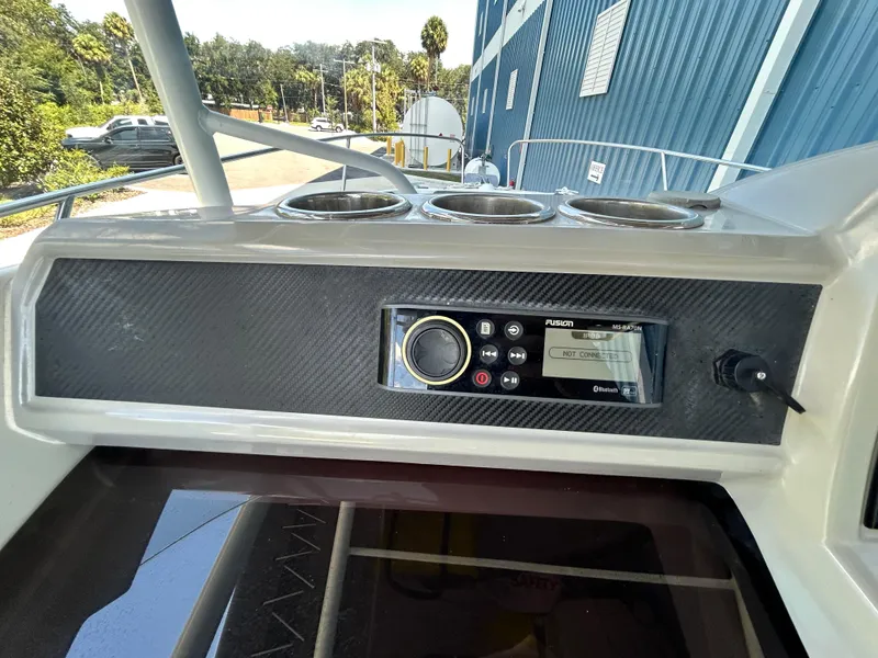 Slide: The Image of Control panel of 2021 Jeanneau Leader 7.5 CC boat with audio system. - 32