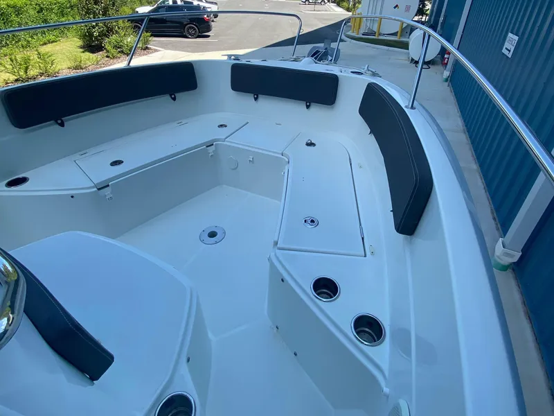 Slide: The Image of 2021 Jeanneau Leader 7.5 CC boat interior with seating and storage compartments. - 37