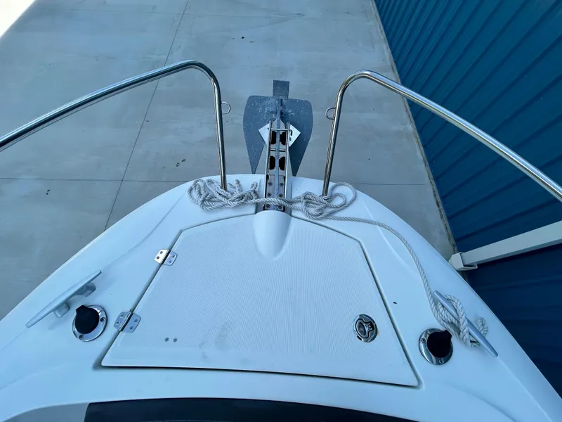 Slide: The Image of 2021 Jeanneau Leader 7.5 CC boat bow with anchor and ropes. - 39