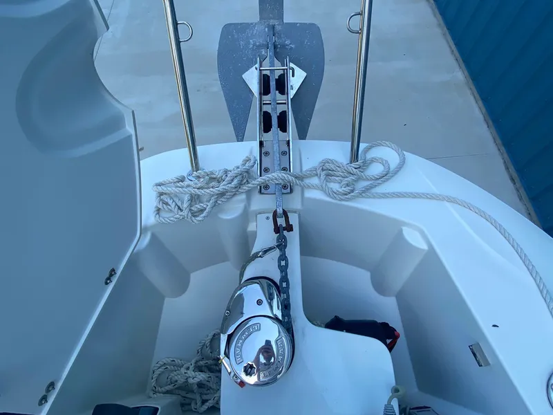 Slide: The Image of Jeanneau Leader 7.5 CC 2021 boat anchor system with ropes and winch. - 40