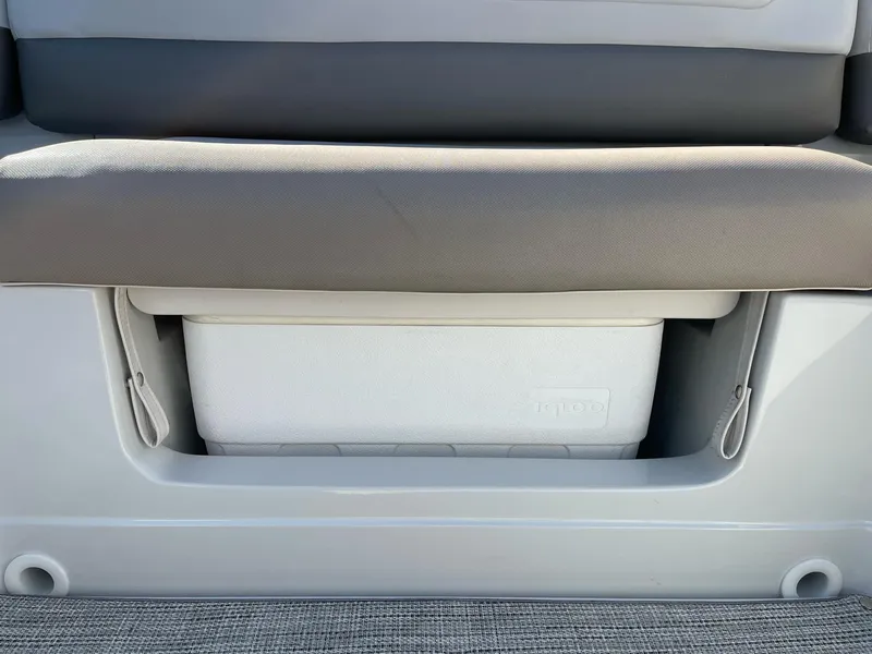Slide: The Image of Crownline 205 SS 2020 boat seat with integrated cooler storage. - 8