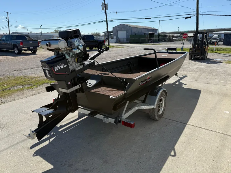 Slide: The Image of 2025 Gator Tail 1748 Gator Series boat on trailer in outdoor setting. - 3