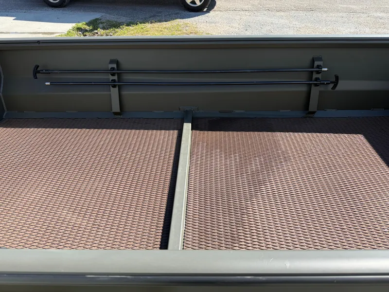 Slide: The Image of 2025 Gator Tail 1748 Gator Series boat interior with textured flooring. - 5