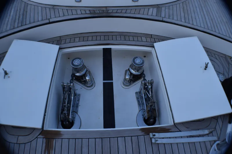 Slide: The Image of 2006 Johnson Country Kitchen yacht deck with open storage compartments and winches. - 12