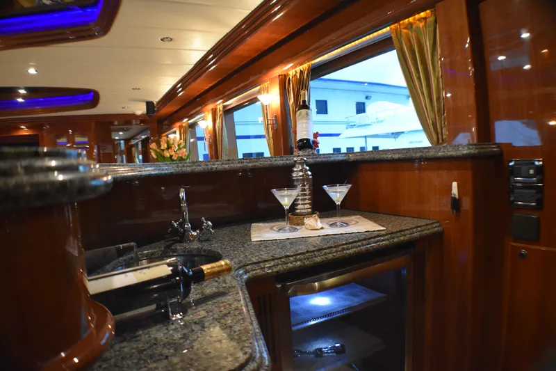 Slide: The Image of Luxurious yacht kitchen interior with granite countertops, wine, and martini glasses, Johnson Country Kitchen 2006. - 29