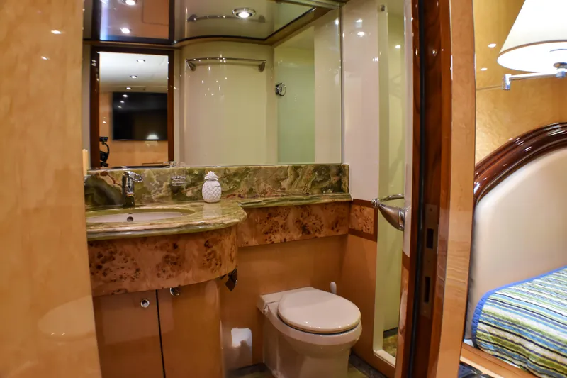 Slide: The Image of Luxurious bathroom in 2006 Johnson Country Kitchen yacht with marble countertop and modern fixtures. - 49