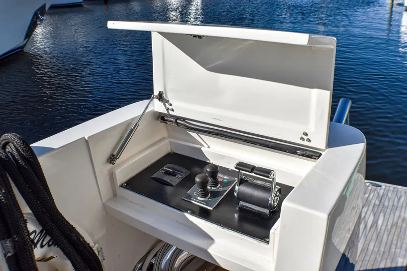 Slide: The Image of Boat control panel on a 2006 Johnson Country Kitchen, docked by the water. - 7