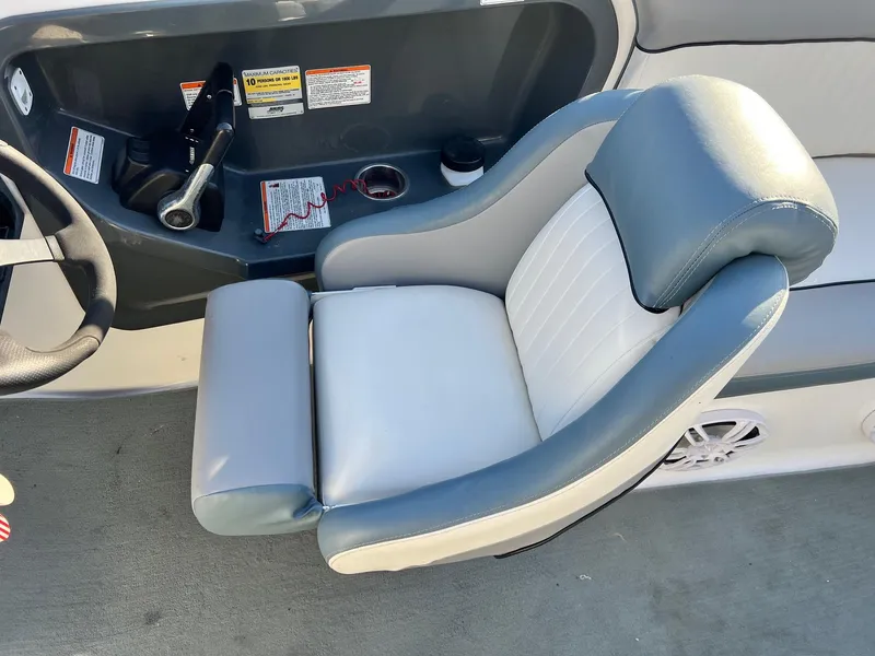 Slide: The Image of 2008 Yamaha SX230 High Output boat seat with steering wheel and control panel. - 12