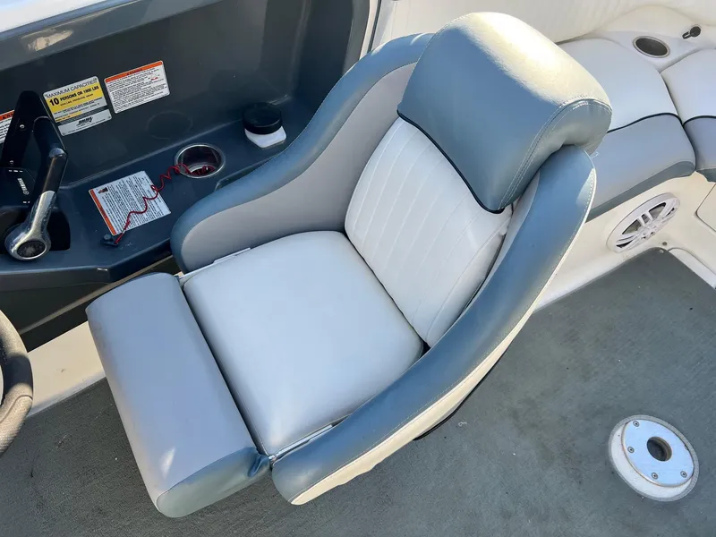 Slide: The Image of 2008 Yamaha SX230 High Output boat seat with control panel and cup holder. - 13
