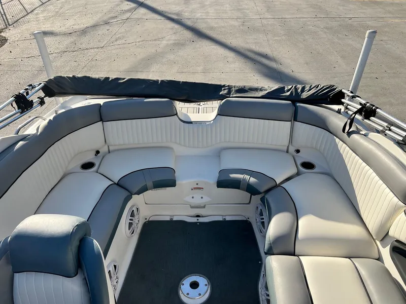 Slide: The Image of 2008 Yamaha Boats SX230 High Output interior with white and gray seating. - 3