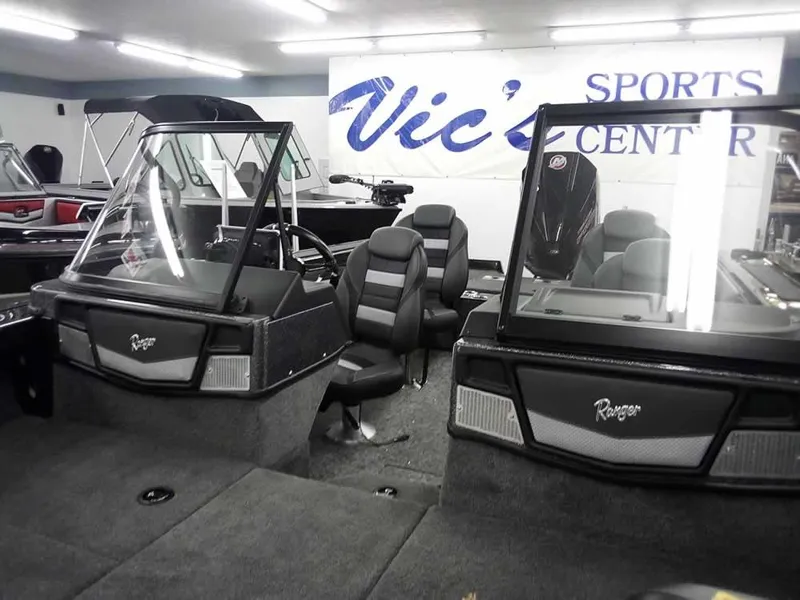 Slide: The Image of 2025 Ranger VX1888 WT boat interior at Vic's Sports Center showroom. - 10
