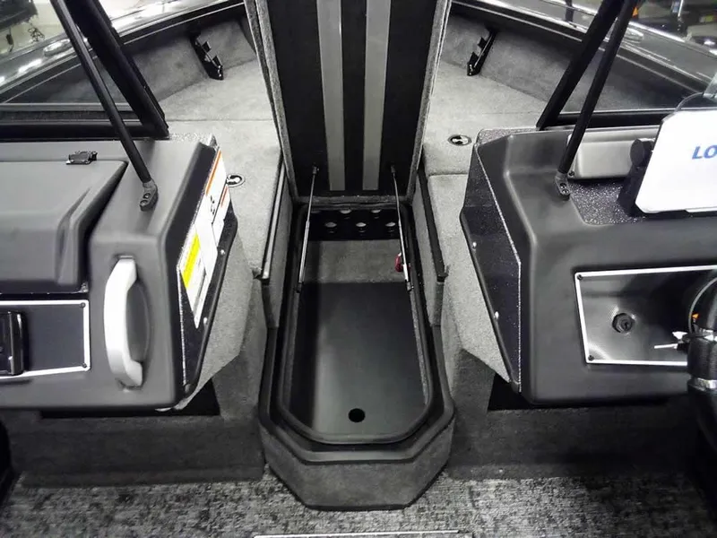 Slide: The Image of 2025 Ranger VX1888 WT boat interior with storage compartments and seating area. - 17