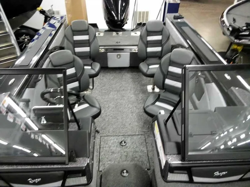 Slide: The Image of 2025 Ranger VX1888 WT boat interior with seating and windshield. - 22